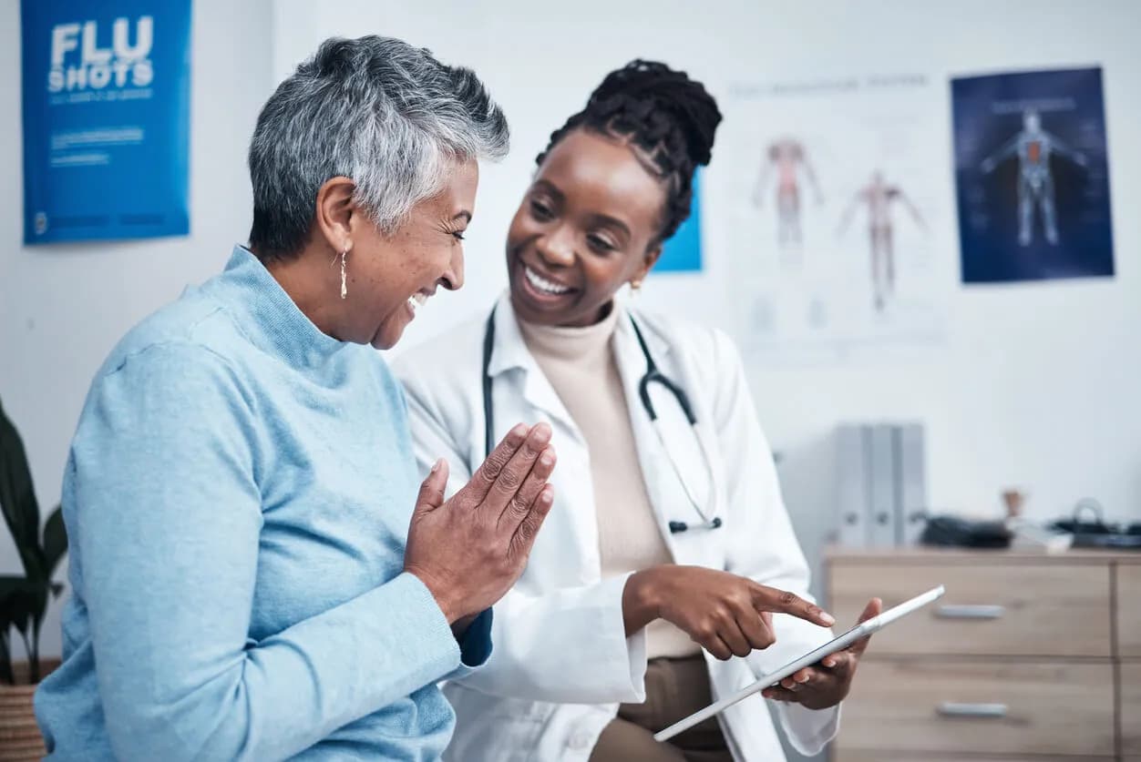 provider speaking with patient about remote patient monitoring