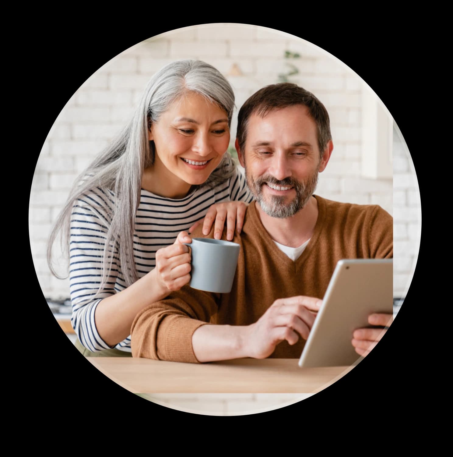 Couple accessing personalized chronic care support at home with KangarooHealth’s connected care technology.