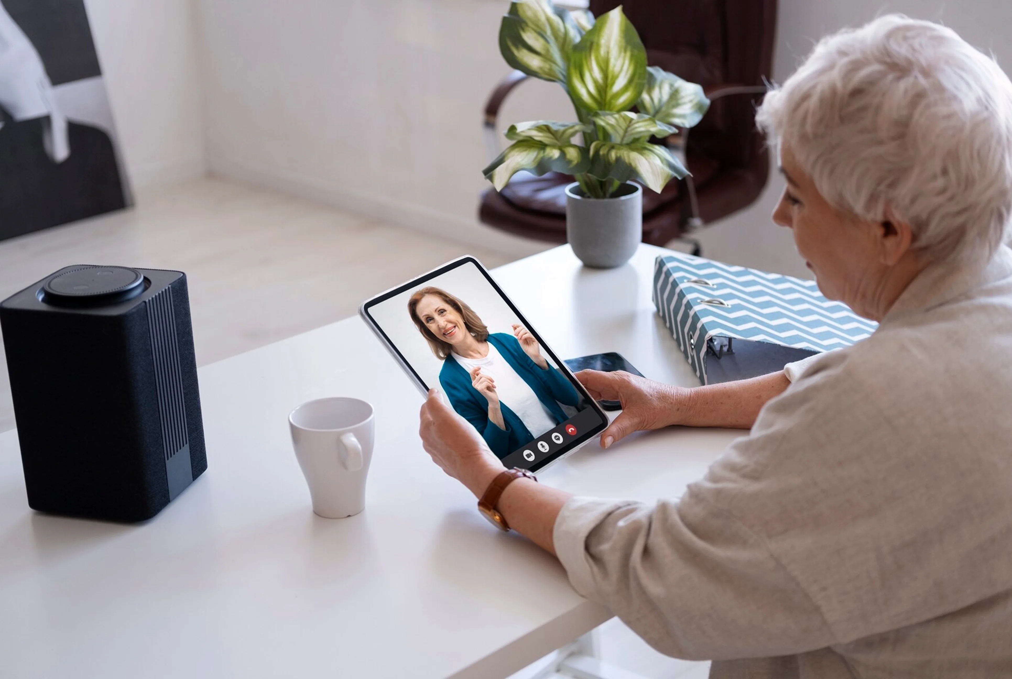 Rural health patient with hypertension taking daily blood pressure reading for preventative care.
