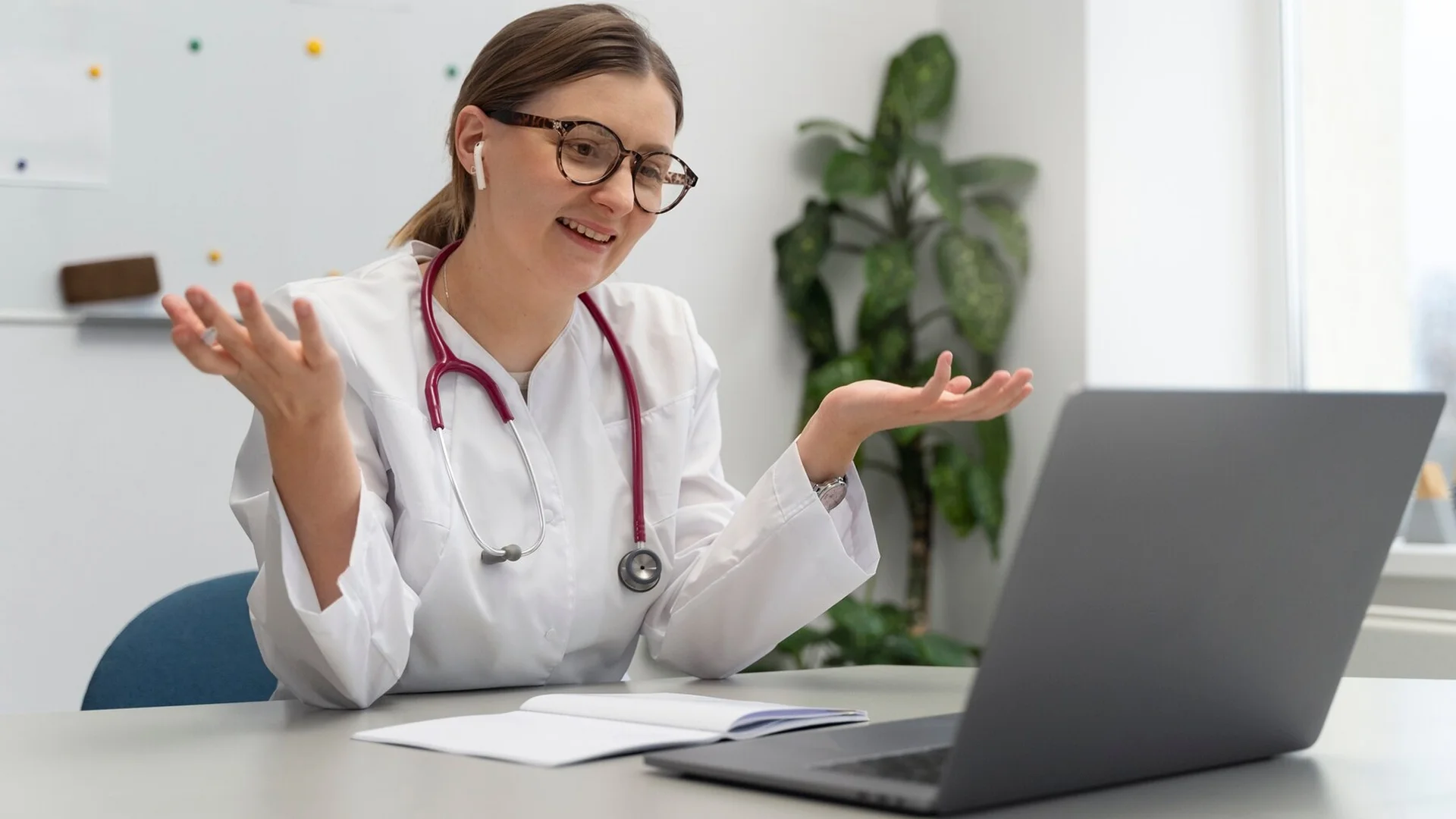 Provider connecting with caregiver by remote telehealth.