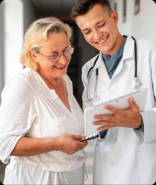 Happy Patient reviewing RPM vitals with primary care physician
