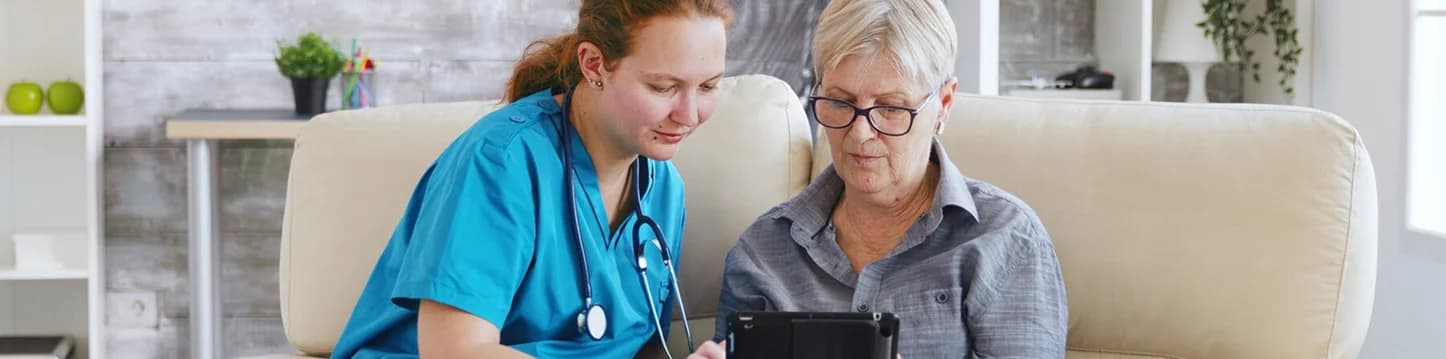 Clinician at desk supporting patient care.