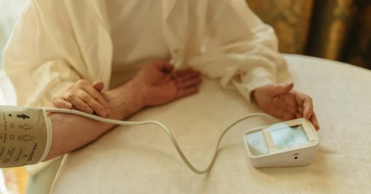 Person using remote patient monitoring device for rural health transformation fund care delivery.